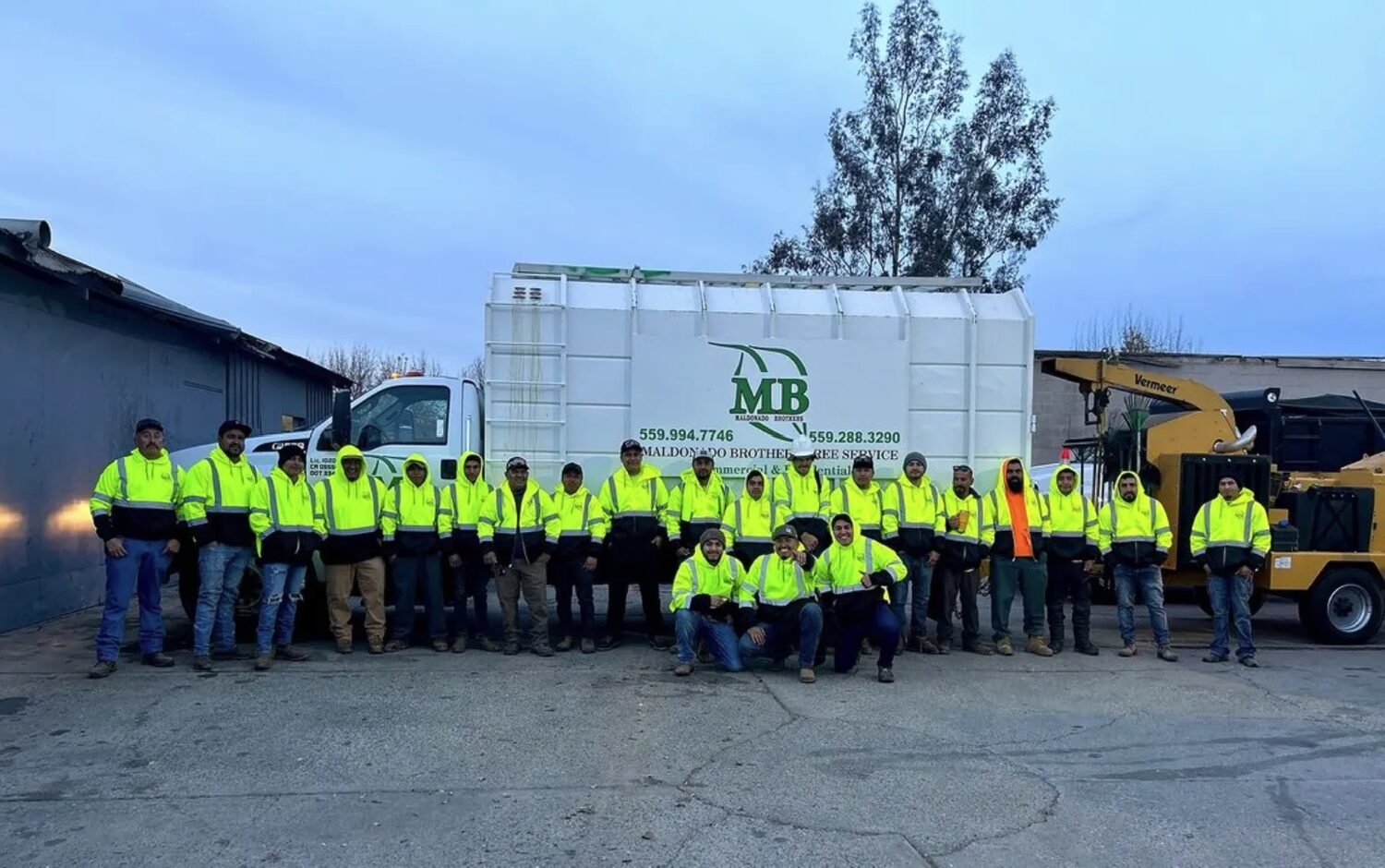The full Maldonado Brothers crew in front of a company truck